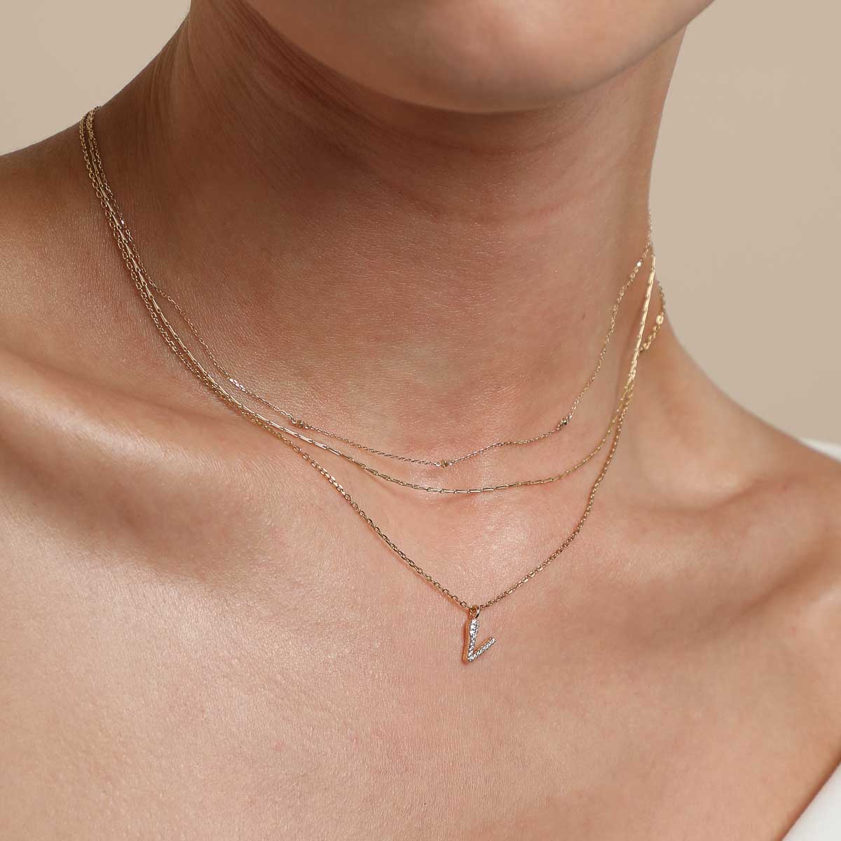 18k Gold Plated Jewellery - V Initial Pavé Pendant Necklace in Gold - Pendant Necklace - Astrid &amp; Miyu